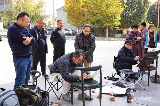 艺术扎根生涯 文字赞扬时期：走遍中国——中国文促会好意思术家写生创作步赴任疆段圆满收官